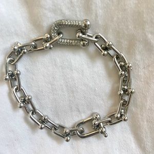 Horseshoe Bracelet with inlaid crystal link. Lobster claw clasp